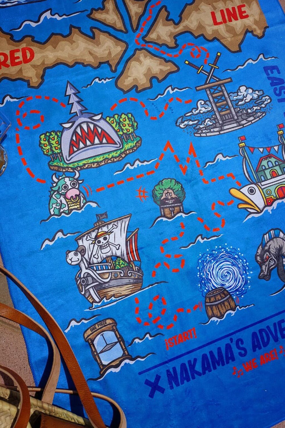 Model using Bon Voyage anime towel - Nakama Clothing