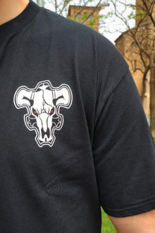 Model wearing Black Bull Magic anime t-shirt - Nakama Clothing