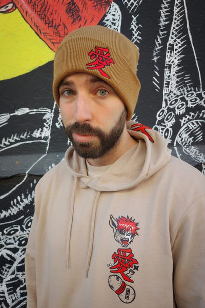 Model wearing Demon Sand anime beanie - Nakama Clothing